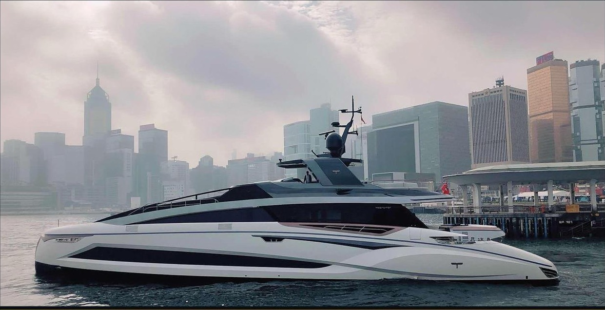 Tecnomar EVO 120 ‘La Vie’ cruising past the Hong Kong skyline