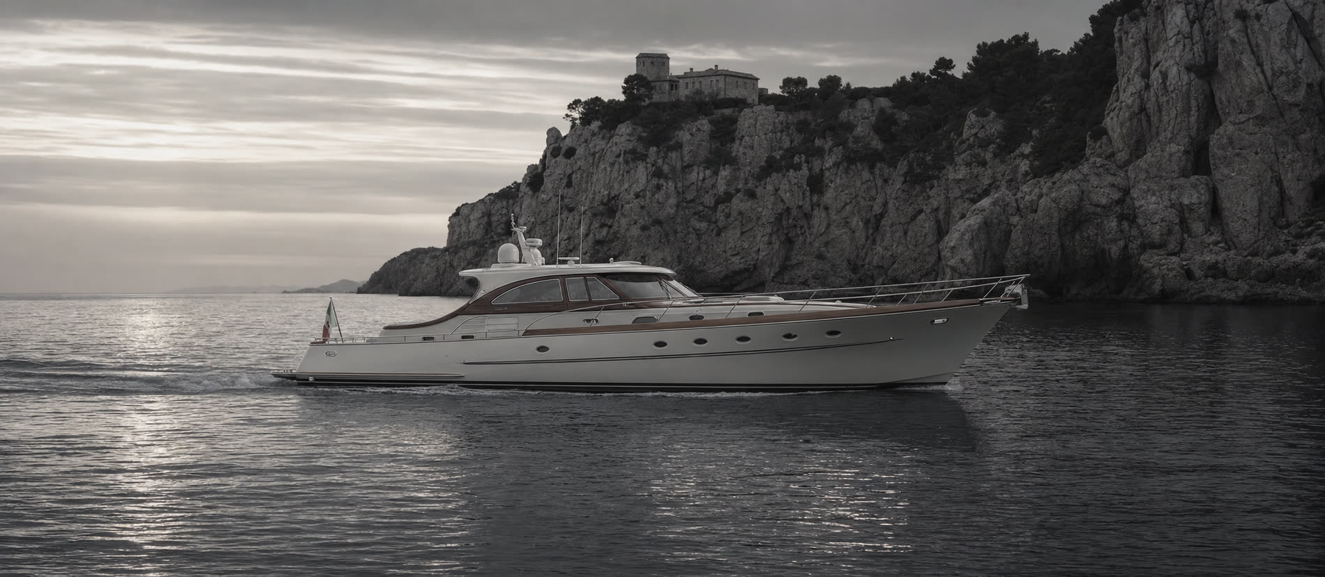 Picchiotti motor yacht cruising near a Tuscan coastline
